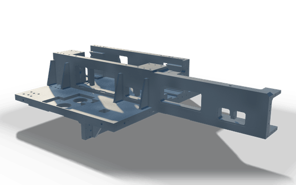 Slide carriage weldment, 2.9 m, in raw steel: a drilled carriage plate with a round bore, carrying two long box beams with ribs and gussets and machined pads along their tops.